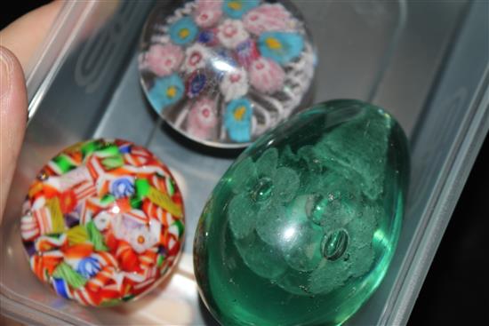 Three small glass paperweights